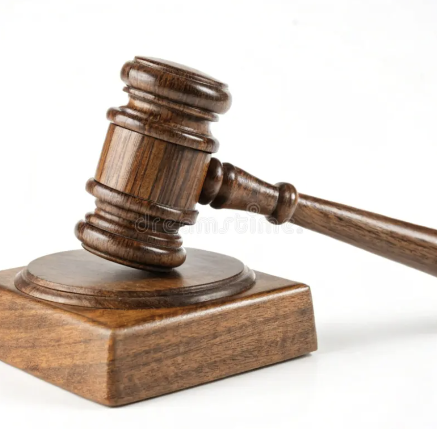 Masonic gavel resting on its block